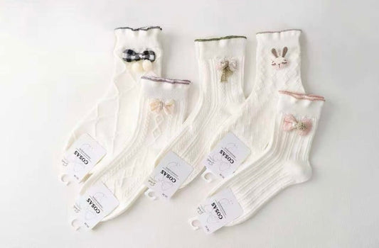 Bombažne nogavice z okrasno pentljo