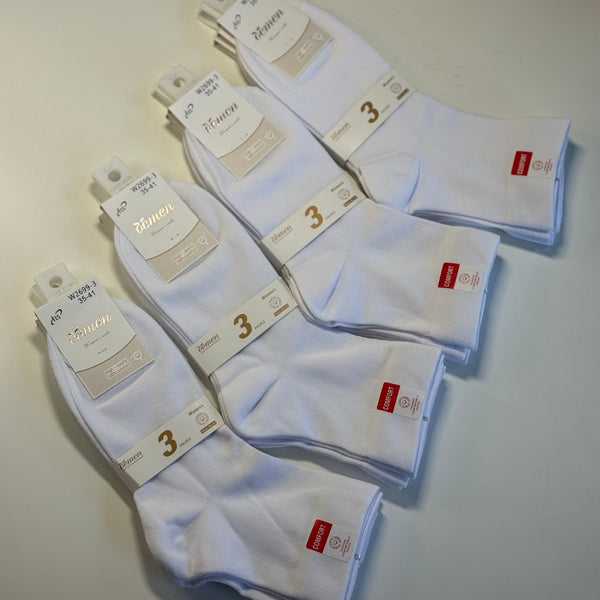 Bele bombažne nogavice